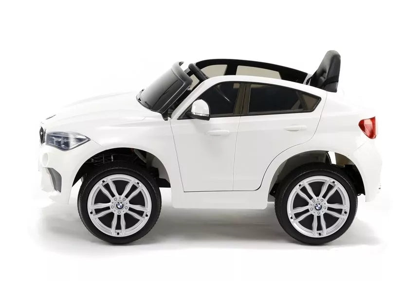 Baltas vaikiškas elektromobilis BMW X6