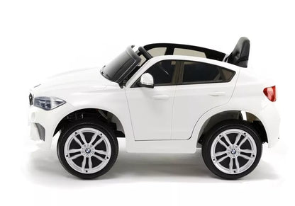 Baltas vaikiškas elektromobilis BMW X6