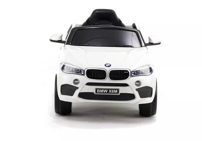 Baltas vaikiškas elektromobilis BMW X6